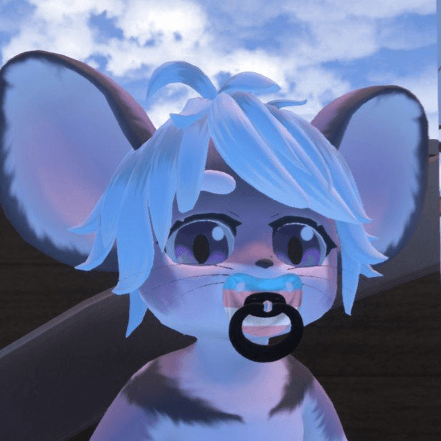 The mouse in Resonite, it has a pacifier in colours of the transgender flag in its mouth, it is facing the viewer and smiling with wide-open eyes.